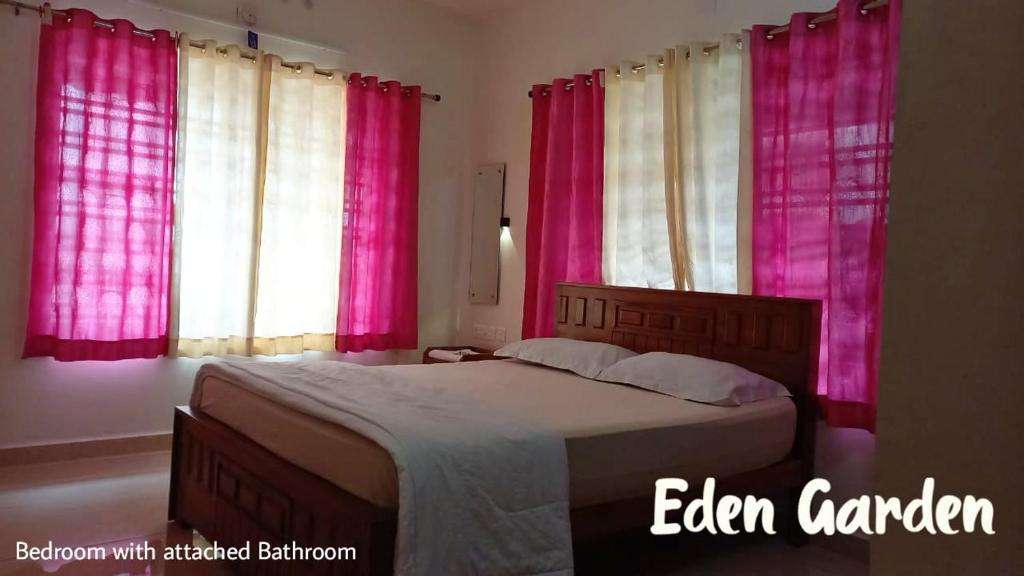 Bedroom 2 with pink curtains